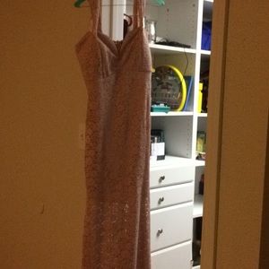 A pink long dress has been worn a few times